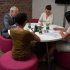 Deadlines mean overtime. Shot of a group of colleagues working late in an office
